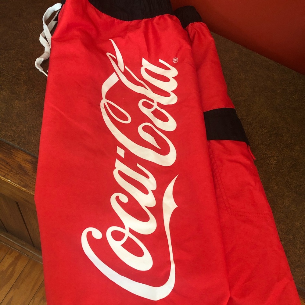COCA COLA men’s swim trunks.